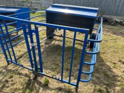 calf feeder on field  ( dammaged)