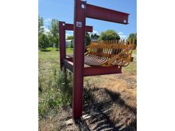 steel bucket rack tel: 819-668-5543 (item located at the consignee's farm )