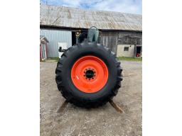 1 roue Gleaner 23.1X34   40%   tel: (438) 340-6037