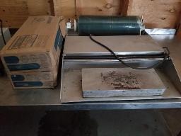 Scelleuse avec plaque chauffante