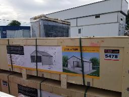 Garage en acier NEUF 21'x19' couleur crème, porte non incluse