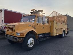 1999, INTERNATIONNAL 4700, CAMION À 6 ROUES    AVEC TARIÈRE