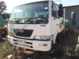 2011 Nissan UD100 Flatdeck EXCLUDING PVC WATER TANKS