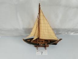 Crafted model of a traditional sailboat