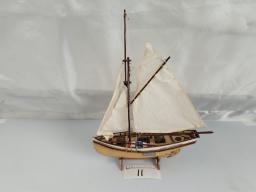 Framed display model of a three?masted sailing ship